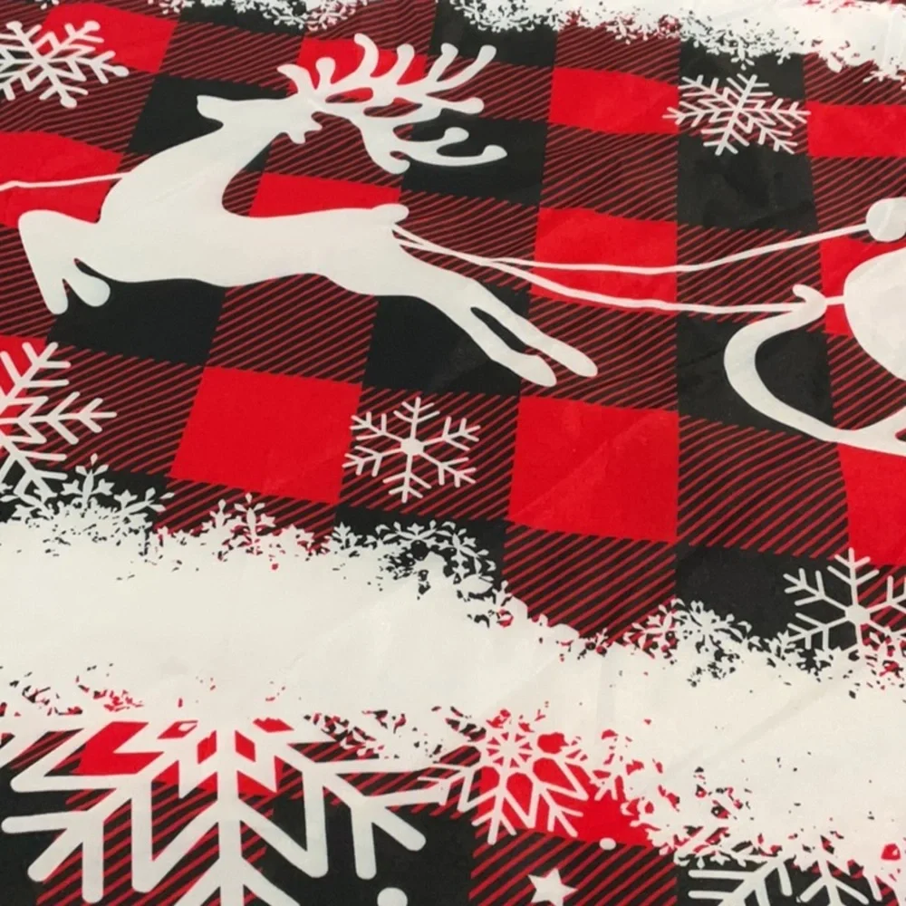 Three Christmas holiday tablecloths
